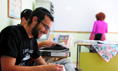 Ulpan_Etzion_Students_Studying_Hebrew_Newspaper